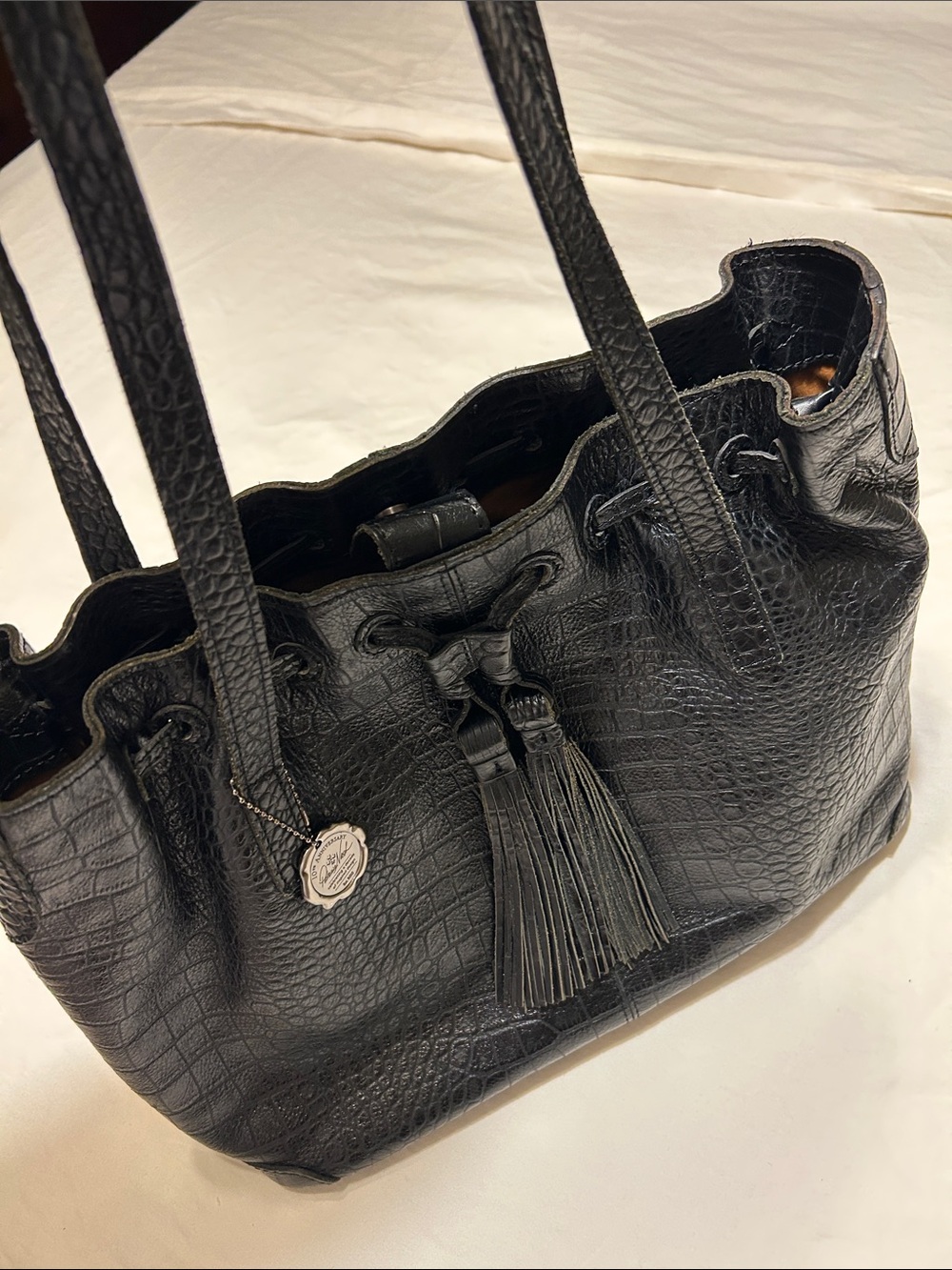 Patricia Nash Black Croc-Embossed Drawstring Tote with Tassel Charm